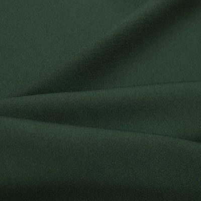 Ткань костюмная 21010 2076, 225 гр/м2, шир.150см, цвет т.зеленый - купить в Йошкар-Оле. Цена 390.73 руб.